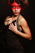 Foto: Young woman with creative make-up Young woman with creative make-up