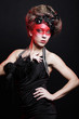 Foto: Young woman with creative make-up Young woman with creative make-up