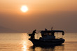 Small fishing boat at sunrise Small fishing boat at sunrise