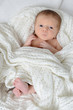 Baby in der Decke