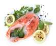 Red fish with lemon, parsley and pepper isolated on white.