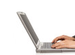 Businessman typing on a notebook