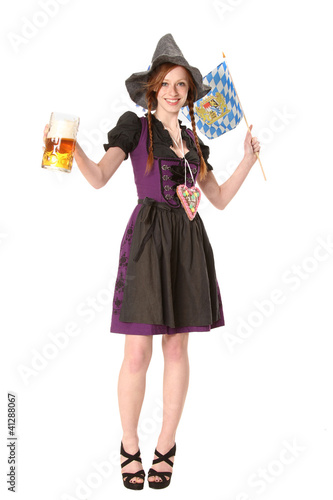 Photo: Frau im Dirndl mit Fahne Frau im Dirndl mit Fahne