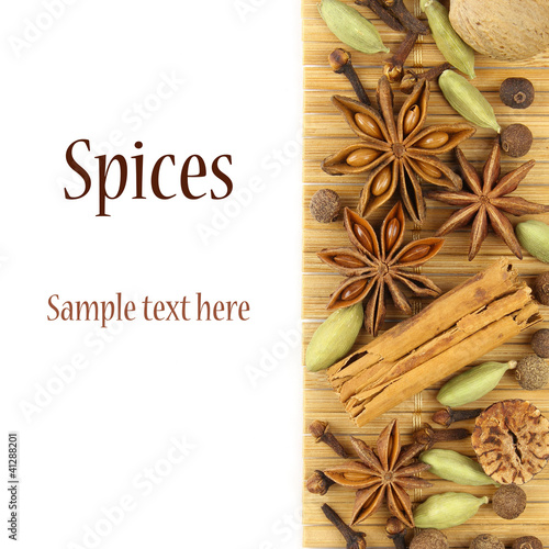 Photo: Spices on bamboo mat with sample text Spices on bamboo mat with sample text