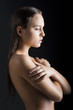 beauty girl with wet skin turned in profile