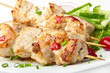 barbecue chicken on a white plate with vegetables