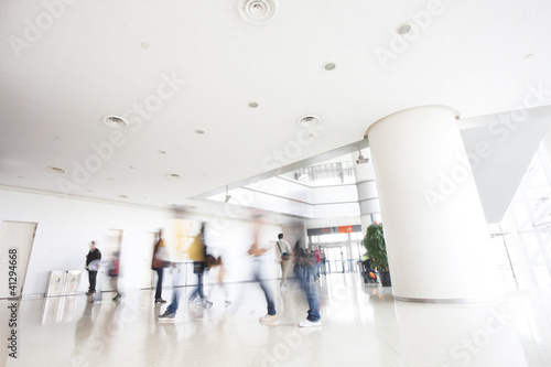 Photo: motion people in modern building motion people in modern building