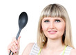 Beautiful young housewife with big spoon