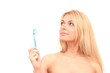 Attractive young woman with a toothbrush