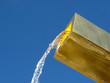 Flowing water from golden fountain. Flowing water from golden fountain.