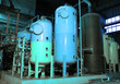 Industrial zone, Steel pipelines and pumps at factory Industrial zone, Steel pipelines and pumps at factory