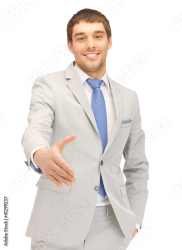 Photo: man with an open hand ready for handshake man with an open hand ready for handshake
