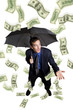 Foto: Raining money on a businessman with umbrella Raining money on a businessman with umbrella