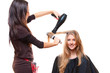Foto: studio shot of hairdresser with hairdryer studio shot of hairdresser with hairdryer