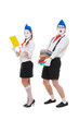 studio shot of funny actors with books