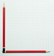Blank graph paper with pencils as axis