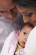 Mixed Race Young Family with Newborn Baby