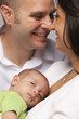 Mixed Race Young Family with Newborn Baby