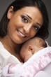 Attractive Ethnic Woman with Her Newborn Baby