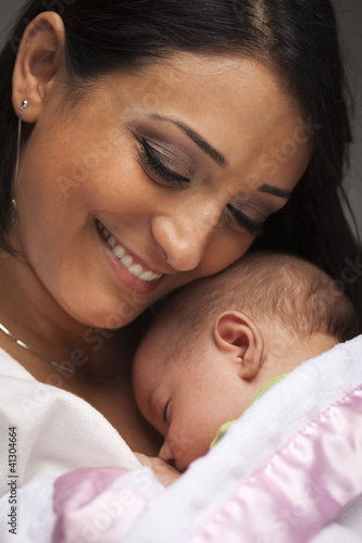 Photo: Attractive Ethnic Woman with Her Newborn Baby Attractive Ethnic Woman with Her Newborn Baby