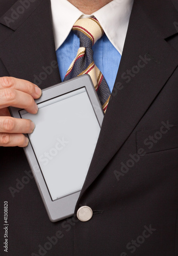 Photo: e-Reader, ebook wird aus dem Sakko gezogen e-Reader, ebook wird aus dem Sakko gezogen