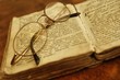 Glasses on vintage book.