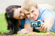 Happy teenage couple taking picture Happy teenage couple taking picture