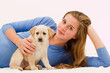 Portrait of young girl with lovely puppy