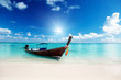 canvas print picture - wood boat on the beach