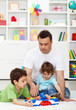 Father spending time with kids at home