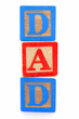 Childs wooden blocks with letters spelling DAD