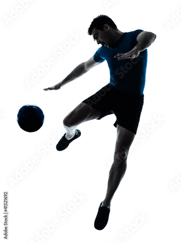 Foto: man soccer football player flying kicking man soccer football player flying kicking