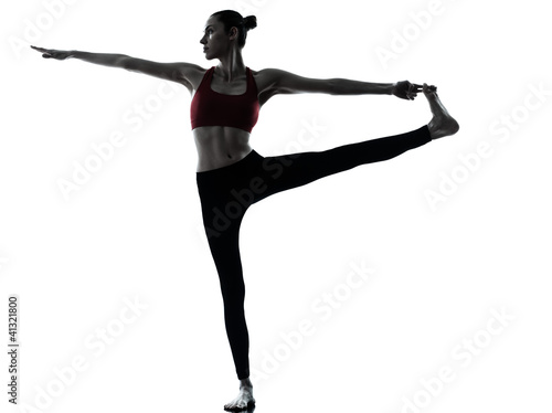 Photo: woman exercising yoga Hasta Padangusthasana woman exercising yoga Hasta Padangusthasana
