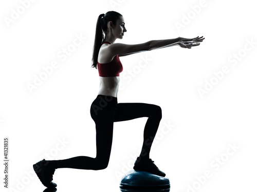 Photo: woman exercising bosu balance ball trainer woman exercising bosu balance ball trainer