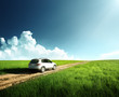 ground road and blurred car ground road and blurred car