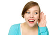 Woman with hand to ear listening Woman with hand to ear listening