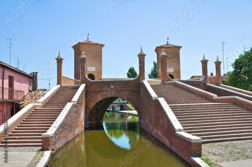 Photo: Trepponti bridge. Comacchio. Emilia-Romagna. Italy. Trepponti bridge. Comacchio. Emilia-Romagna. Italy.
