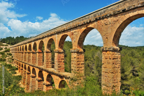 Photo: Roman Aqueduct Pont del Diable in Tarragona, Spain Roman Aqueduct Pont del Diable in Tarragona, Spain