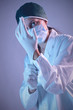 Photo: Doctor gets ready for a medical procedure. Doctor gets ready for a medical procedure.