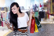 Photo: Beautiful woman at shopping center Beautiful woman at shopping center