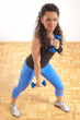 Attractive brunette doing some fitness exercises