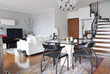 Foto: Interior decoration of a apartment, glass table and staircase Interior decoration of a apartment, glass table and staircase
