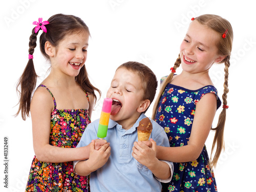 Photo: Two girls and boy with ice cream Two girls and boy with ice cream