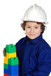 Future builder constructing a brick wall with toy pieces