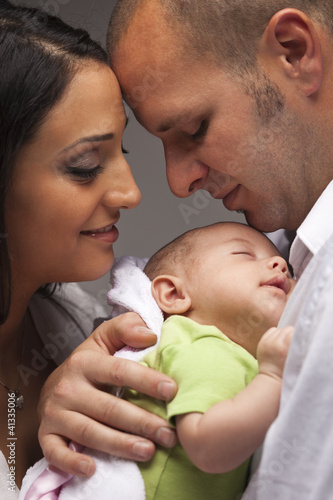 Photo: Mixed Race Young Family with Newborn Baby Mixed Race Young Family with Newborn Baby
