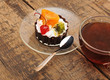 delicious cake with fruit and a cup of tea delicious cake with fruit and a cup of tea