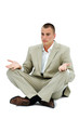 Young employee meditating during lunch time