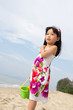 Portrait of little girl on beach
