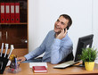 Smiling man talking on mobile phone Smiling man talking on mobile phone