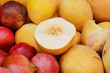 Close up of melons and pomegranates Close up of melons and pomegranates